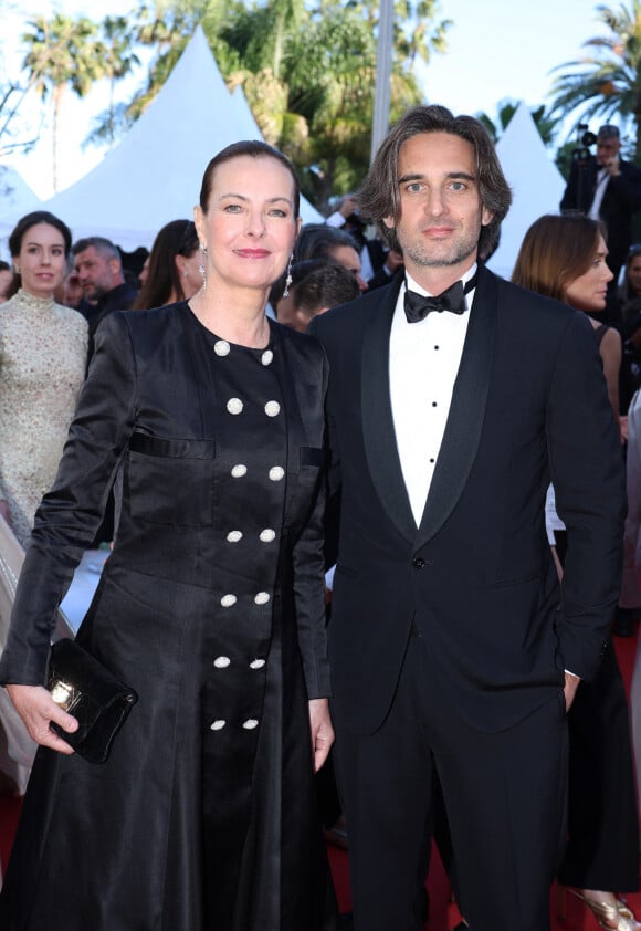 Carole Bouquet et son fils Dimitri Rassam - Montée des marches du film " Megalopolis " lors du 77ème Festival International du Film de Cannes, au Palais des Festivals à Cannes. Le 16 mai 2024