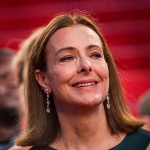 Carole Bouquet très émue lors de la descente des marches du film "The Little Prince" (Le Petit Prince) lors du 68 ème Festival International du Film de Cannes à Cannes le 22 mai 2015, le film produit par son fils Dimitri Rassam. 