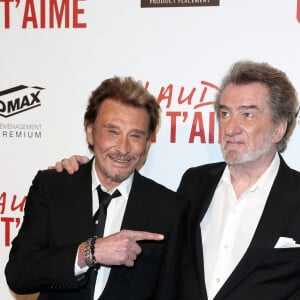 Il a aussi évoqué son ami Johnny Hallyday.
Johnny Hallyday et Eddy Mitchell - Avant-première de 'Salaud on t'aime' à l'UGC Normandie sur les Champs-Elysées à Paris le 31 mars 2014.