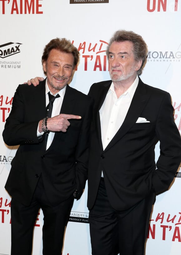 Il a aussi évoqué son ami Johnny Hallyday.
Johnny Hallyday et Eddy Mitchell - Avant-première de 'Salaud on t'aime' à l'UGC Normandie sur les Champs-Elysées à Paris le 31 mars 2014.