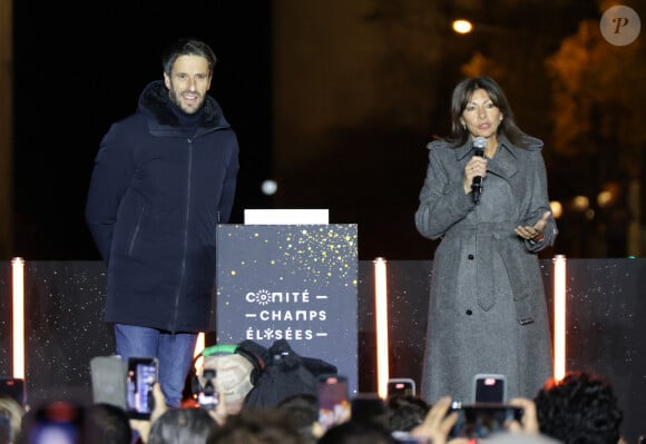 Tony Estanguet et Anne Hidalgo - Lancement des Illuminations de Noël des Champs-Elysées à Paris le 24 novembre 2024. © Coadic Guirec/Bestimage