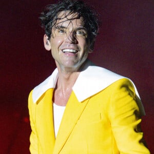 Mika sur la scène du "Printemps de Perouges" au Château de Saint-Maurice-de-Remens, le 27 juin 2024. 