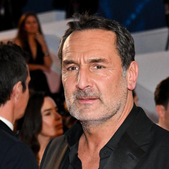 Gilles Lellouche - Descente des marches du film " L'amour ouf " lors du 77ème Festival International du Film de Cannes, au Palais des Festivals à Cannes. Le 23 mai 2024 © Bruno Bebert / Bestimage 