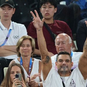 Laure Manaudou et Florent Manaudou - Les célébrités en tribunes pendant l'épreuve de basketball de Demi-Finale opposant la France à l'Allemagne lors des Jeux Olympiques de Paris 2024 (JO) à l'Arena Bercy, à Paris, France, le 8 août 2024. © Jacovides-Perusseau/Bestimage 