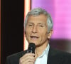 Ce dernier le conduit à bord d'un modèle de voiture très luxueux et avant-gardiste
Nagui - Les personnalités se mobilisent lors de la 37ème édition du Téléthon sur le plateau de France 2, avec pour parrain Vianney. Le 8 décembre 2023. © Coadic Guirec / Bestimage