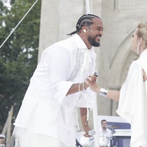 Slimane, Lara Fabian lors du dernier relais de La Flamme Olympiques avant la cérémonie d'ouverture des Jeux Olympiques (JO) de Paris 2024 à Saint-Denis, Seine Saint-Denis, France, le 26 juillet 2024. © Melloul-Tribeca/Bestimage