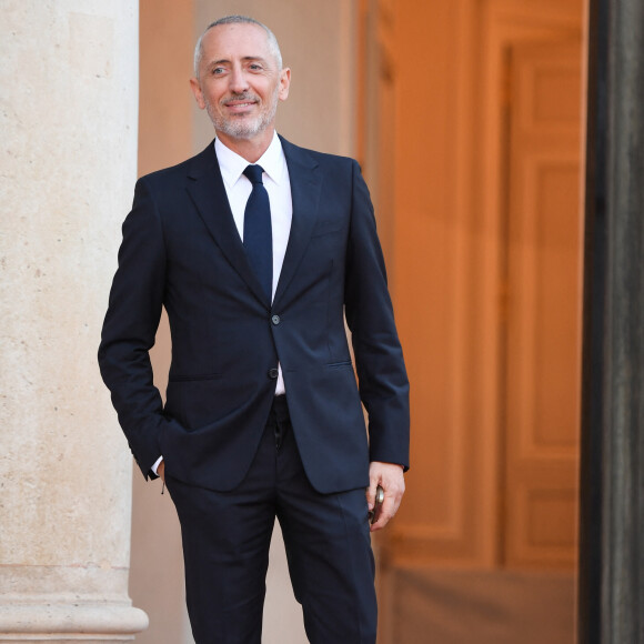 "Vous pourriez poser cette question à tous les gens qui ouvrent un restaurant alors qu'il y en déjà plein! Ce comedy club m'inspire de la nouveauté, de la fraîcheur. "
Gad Elmaleh arrive au palais de l'Élysée pour un dîner offert aux chefs d'état et de gouvernement par le président de la république dans le cadre du XIXe Sommet de la Francophonie à Paris, le 4 octobre 2024. © Lionel Urman / Panoramic / Bestimage 