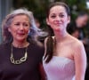 "Elle a eu milles vies" 
Marion Cotillard et sa mère Niseema Theillaud - Montée des marches du film "L'homme qu'on aimait trop" lors du 67 ème Festival du film de Cannes. 