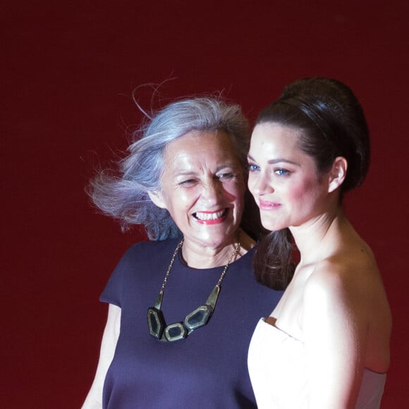 Marion Cotillard et sa mère Niseema Theillaud - Montée des marches du film "L'homme qu'on aimait trop" lors du 67 ème Festival du film de Cannes – Cannes le 21 mai 2014. 