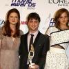 Au centre : Bonnie Wright, Daniel Radcliffe et Emma Watson lors des National Movie Awards à Londres le 26 mai 2010