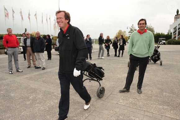 Hubert Auriol et Emmanuel Chain lors du tournoi de golf des personnalités à Guyancourt le 15 octobre 2010