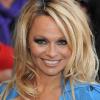 Pamela Anderson apporte son soutien à la PETA durant un photocall afin de présenter la dernière campagne à Londres le 24 octobre 2010