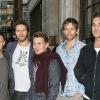Robbie Williams et Take That quittent les studios de Radio 1 à Londres, le 27 octobre 2010