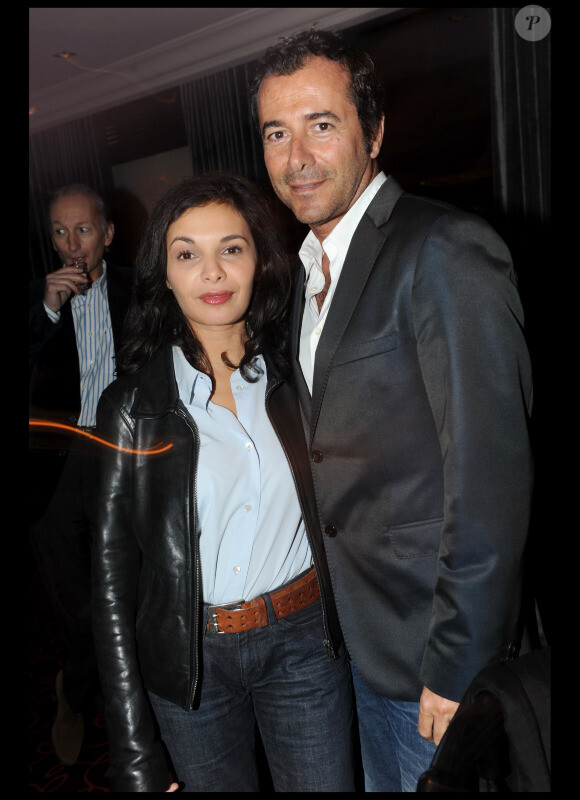 Saïda Jawad et Bernard Montiel lors de la soirée Chez Castel pour le nouvel an russe, organisée par la marque de vodka Smirnoff, le 13 janvier 2011 à Paris
