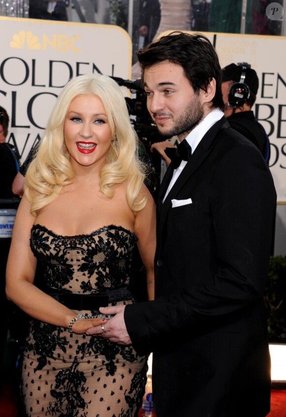 Christina Aguilera et Matthew Rutler lors de la 68e cérémonie des Golden Globes au Beverly Hilton Hotel de Los Angeles le 16 janvier 2011