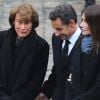 Nicolas Sarkozy et Carla Bruni entourent Béatrice, veuve de Philippe Séguin, aux obsèques de l'homme politique, le 11 janvier 2010.
