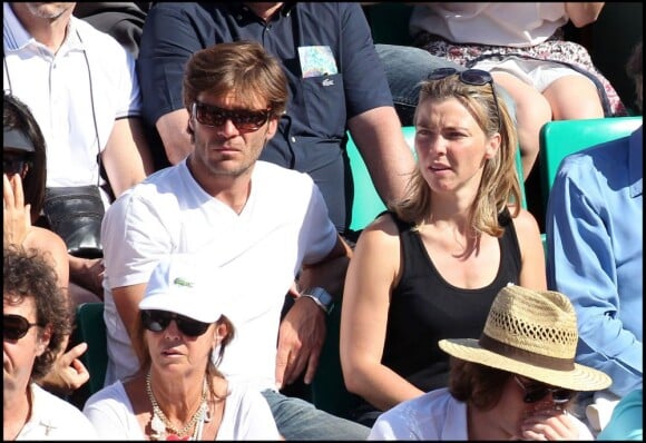 Nathalie Vincent et un ami au tournoi de Roland-Garros, le 2 juin 2011.