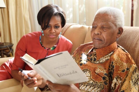 Michelle Obama accompagnée de ses filles lors de sa visite en Afrique du Sud,a rencontré Nelson Mandela, le 21 juin 2011