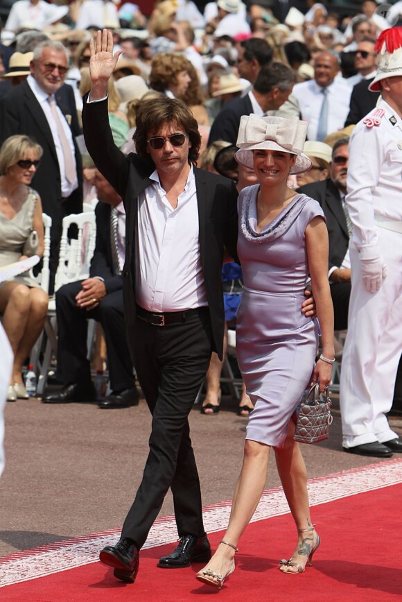 Jean-Michel Jarre et sa fille Emilie arrivent à la cérémonie religieuse du mariage du prince Albert et de Charlene Wittstock, à Monaco, le 2 juillet 2011
