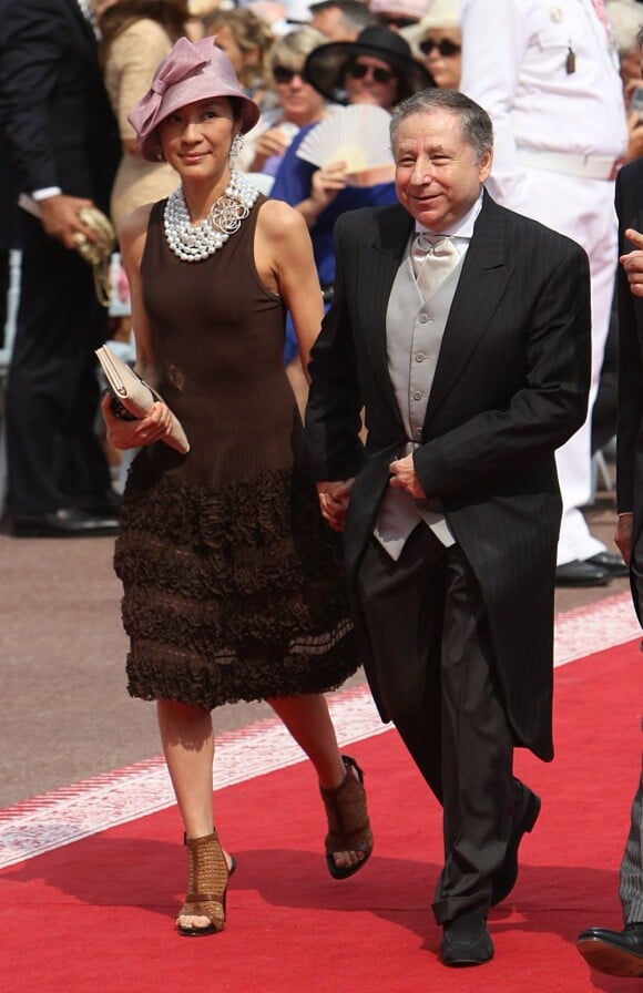 Jean Todt et Michelle Yeoh arrivent à la cérémonie religieuse du mariage du prince Albert et de Charlene Wittstock, à Monaco, le 2 juillet 2011
