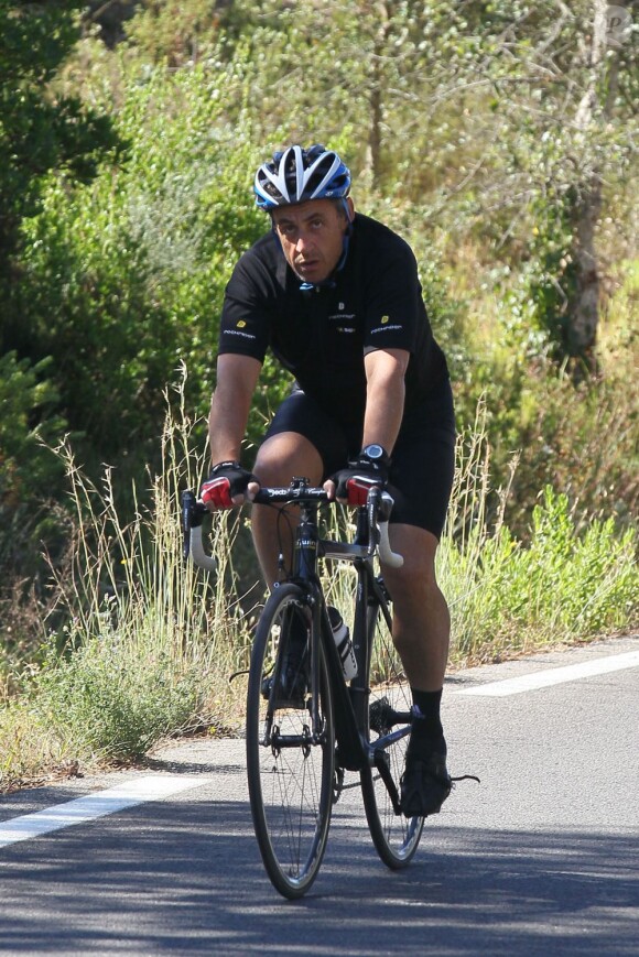 Nicolas Sarkozy en excursion à vélo, le 18 juillet 2011.