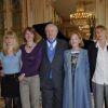 Claude Rich, entouré de sa femme Catherine et de ses filles, épinglé au ministère de la Culture, à Paris, le 19 juillet 2011.