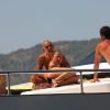 Christian Audigier le 15 août 2011 à Ibiza en vacances avec ses amis, ses fils et sa compagne