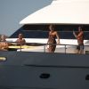 Christian Audigier le 15 août 2011 à Ibiza en vacances avec ses amis, ses fils et sa compagne