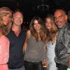 Christian Audigier en club avec sa compagne Nathalie Sorensen, des amis et Cathy Guetta le 15 août 2011 à Ibiza 