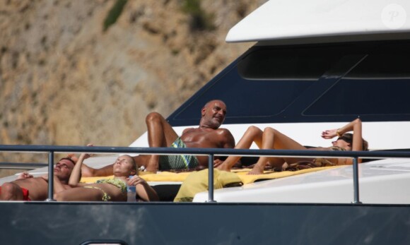 Christian Audigier, ses fils et sa compagne Nathalie Sorensen en vacances à Ibiza le 25 août 2011