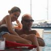 Christian Audigier et sa compagne Nathalie Sorensen en vacances à Ibiza le 25 août 2011