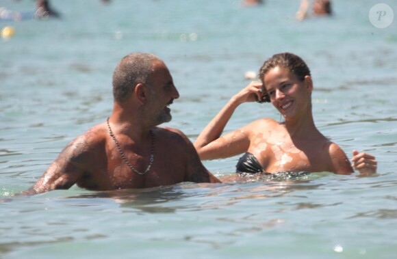 Christian Audigier et sa compagne Nathalie Sorensen en vacances à Ibiza le 25 août 2011