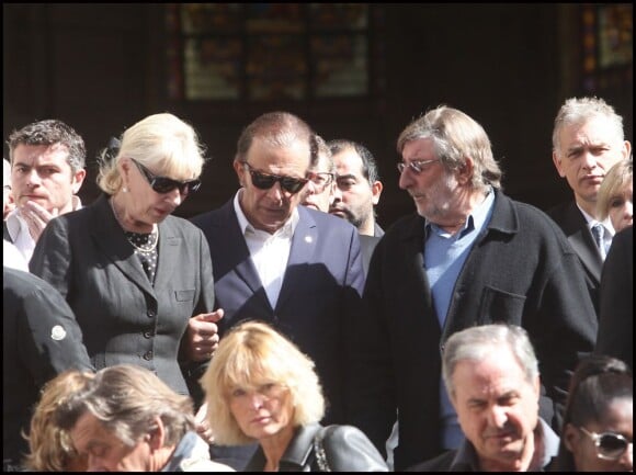 Roland Giraud et son épouse Maaike lors des obsèques de Patrick Guillemin, en l'église Saint-Roch, à Paris, le 30 août 2011.