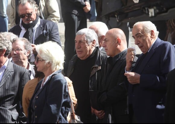 Jean-Pierre Castaldi et Pierre Bénichou lors des obsèques de Patrick Guillemin, en l'église Saint-Roch, à Paris, le 30 août 2011.