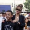 Rihanna s'occupe de son petit frère Rajad Fenty à Los Angeles le 3 septembre 2011