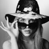 Clémence Poésy pose devant l'objectif de Karl Lagerfeld pour présenter la collection  automne-hiver 2011 des chapeaux et accessoires de la Maison Michel imaginés par Laetitia Crahay, directrice artistique de la Maison Michel et responsable accessoires/bijoux chez Chanel. 