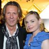 Alain Crevet et Julie Judd lors de la soirée chez S.T. Dupont le 29 septembre 2011