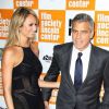Stacy Keibler et Georges Clooney lors de l'avant-première du film The Descendants au festival du film de New York le 16 octobre 2011
