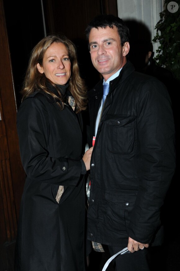 Manuel Valls et son épouse Anne à la soirée organisée à L'Arc Paris, avec George Clooney, le 18 octobre 2011.