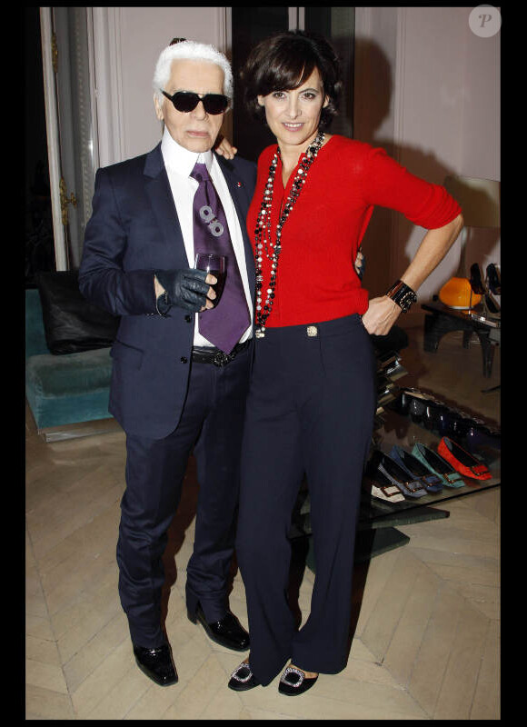 Karl Lagerfeld et Inès de la Fressange lors de la soirée du magazine Tag Mag et Roger Vivier à Paris le 20 octobre 2011