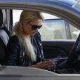 Trois infractions au code de la route pour Paris Hilton, se rendant à ses bureaux. Beverly Hills, le 27 octobre 2011. 