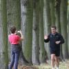 Nicolas Sarkozy fait son jogging dans les allées du château de Versailles, le 30 octobre 2011... Il est photographié par une joggeuse. Quelle star !