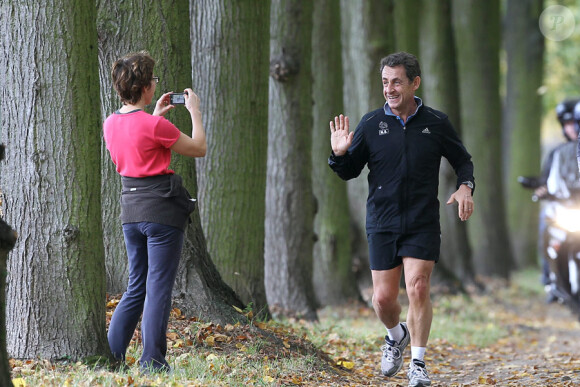 Nicolas Sarkozy fait son jogging dans les allées du château de Versailles, le 30 octobre 2011