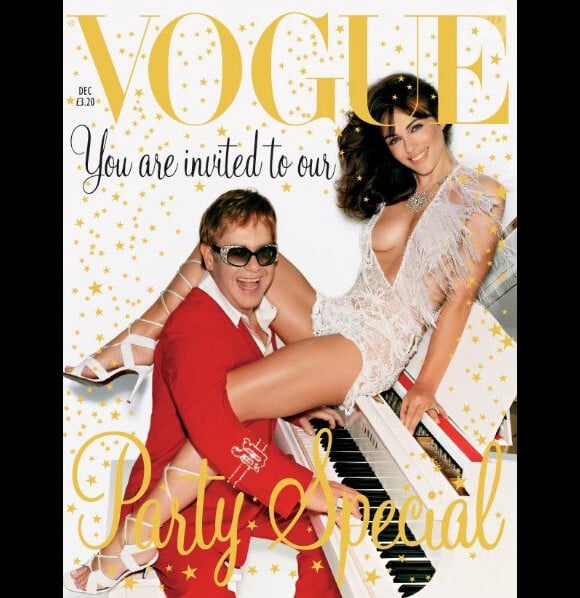 Elizabeth Hurley et Elton John fêtent la fin de l'année 2002 avec le magazine Vogue UK. Décembre 2002.