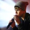 Justin Bieber allume les lumières de Noël au centre commercial Westfield, à Londres, le lundi 7 novembre 2011.