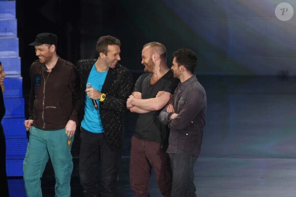 Coldplay sur le plateau de l'émission Il più grande spettacolo dopo il weekend, à Rome, le 21 novembre 2011.