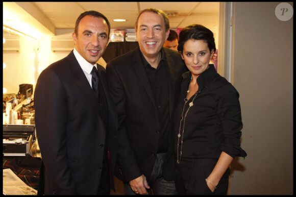 Nikos Aliagas, Jean-Marc Morandi et Faustine Bollaert lors de la soirée "Europe 1 fait Bobino" à Paris, le 28 novembre 2011