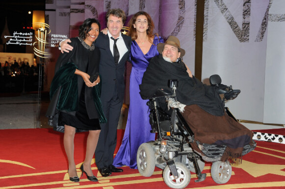 François Cluzet et son épouse Narjiss, avec Philippe Pozzo di Borgo et sa femme lors du festival international du film de Marrakech le 10 décembre 2011