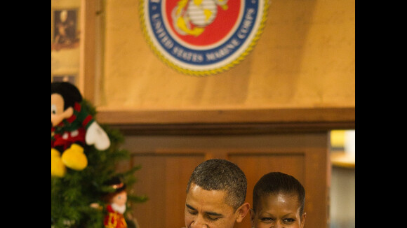Barack et Michelle Obama, des bébés dans les bras, craquent littéralement