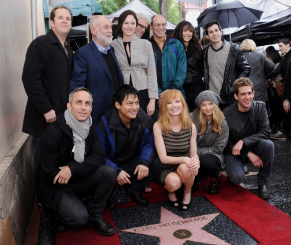 Marg Helgenberger reçoit son étoile devant ses collègues des Experts, à Los Angeles, le 23 janvier 2012